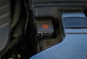 positive grid cover for battery