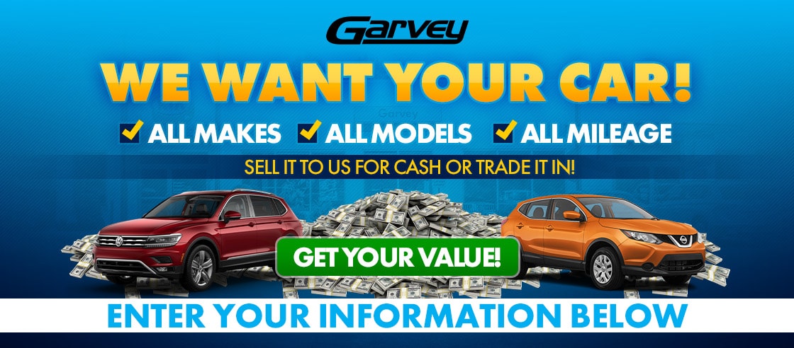 Garvey's used car buying center banner