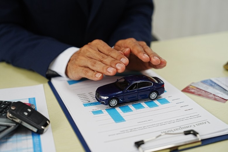toy car on loan papers