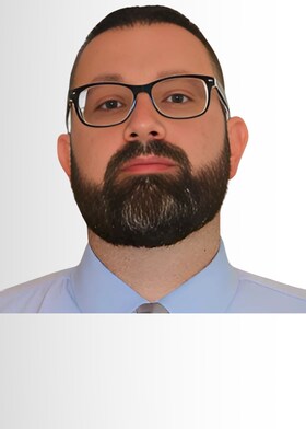 Staff member Travis Walsh from ID_df05bcaefddc