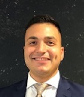Staff member ADRIAN GOMEZ from f9295dc4c1b8