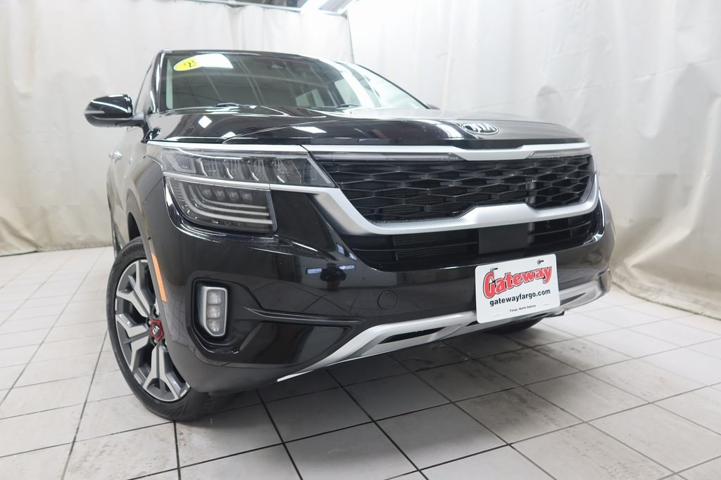 Used 2021 Kia Seltos SX with VIN KNDETCA25M7107234 for sale in Fargo, ND