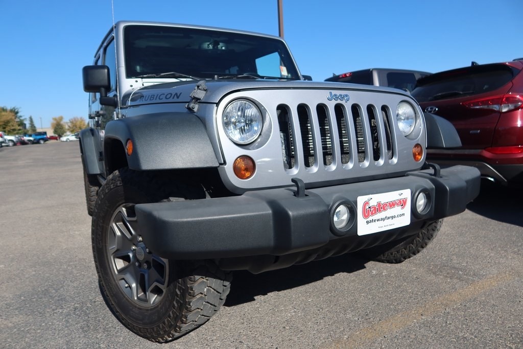 Used 2013 Jeep Wrangler Unlimited Rubicon with VIN 1C4BJWFG1DL548543 for sale in Fargo, ND