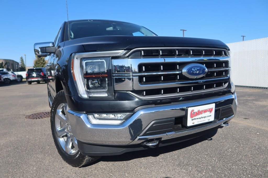 Used 2021 Ford F-150 Lariat with VIN 1FTFW1E85MFC33307 for sale in Fargo, ND