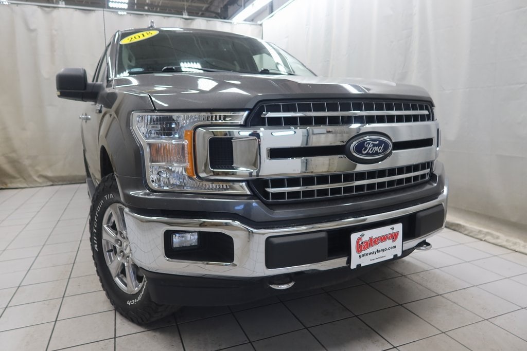 Used 2018 Ford F-150 XLT with VIN 1FTEW1EPXJKD07777 for sale in Fargo, ND