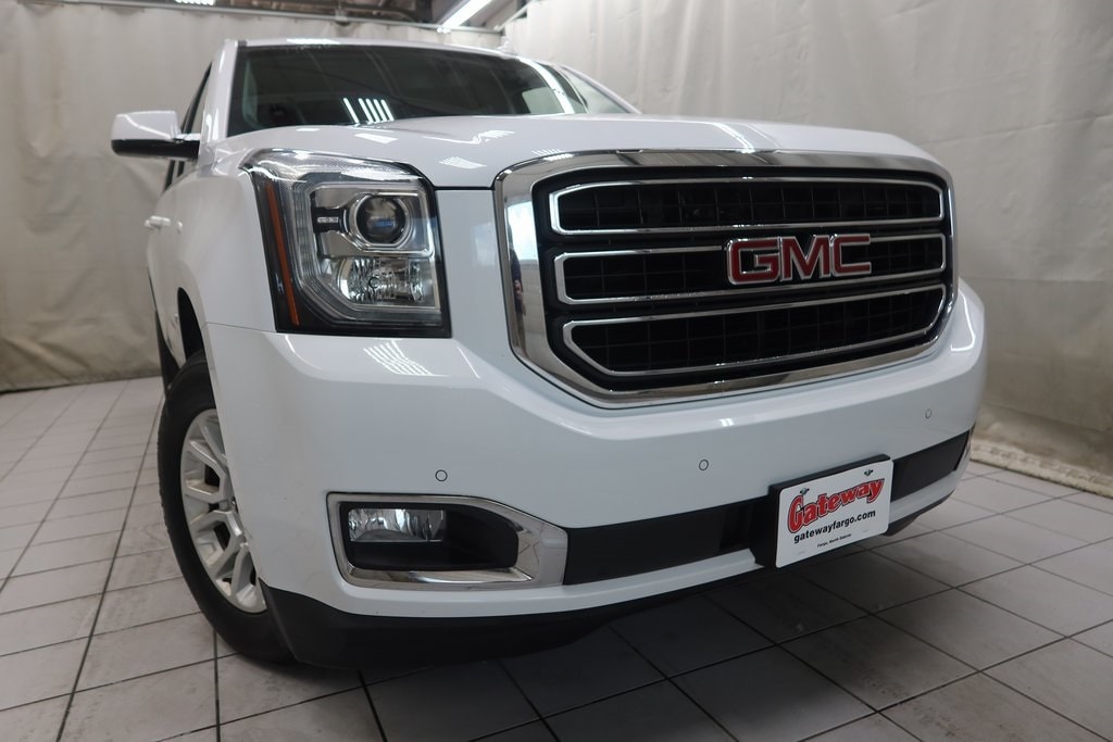 Used 2017 GMC Yukon SLE with VIN 1GKS2AKC9HR137546 for sale in Fargo, ND