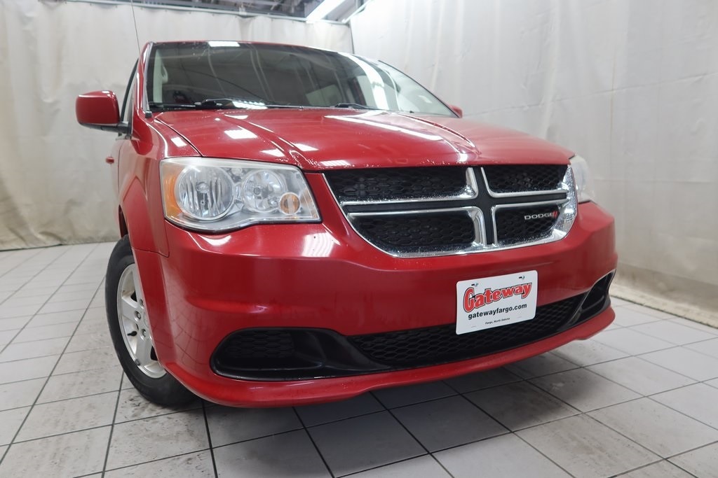 Used 2013 Dodge Grand Caravan SXT with VIN 2C4RDGCG7DR635936 for sale in Fargo, ND