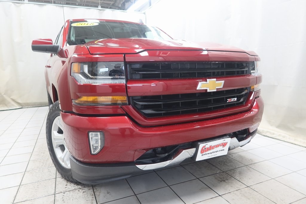 Used 2018 Chevrolet Silverado 1500 LT with VIN 3GCUKREC0JG151288 for sale in Fargo, ND
