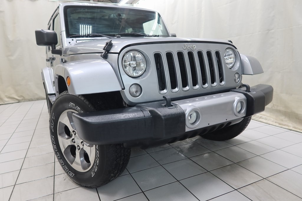 Used 2018 Jeep Wrangler Unlimited Sahara with VIN 1C4BJWEG4JL903993 for sale in Fargo, ND