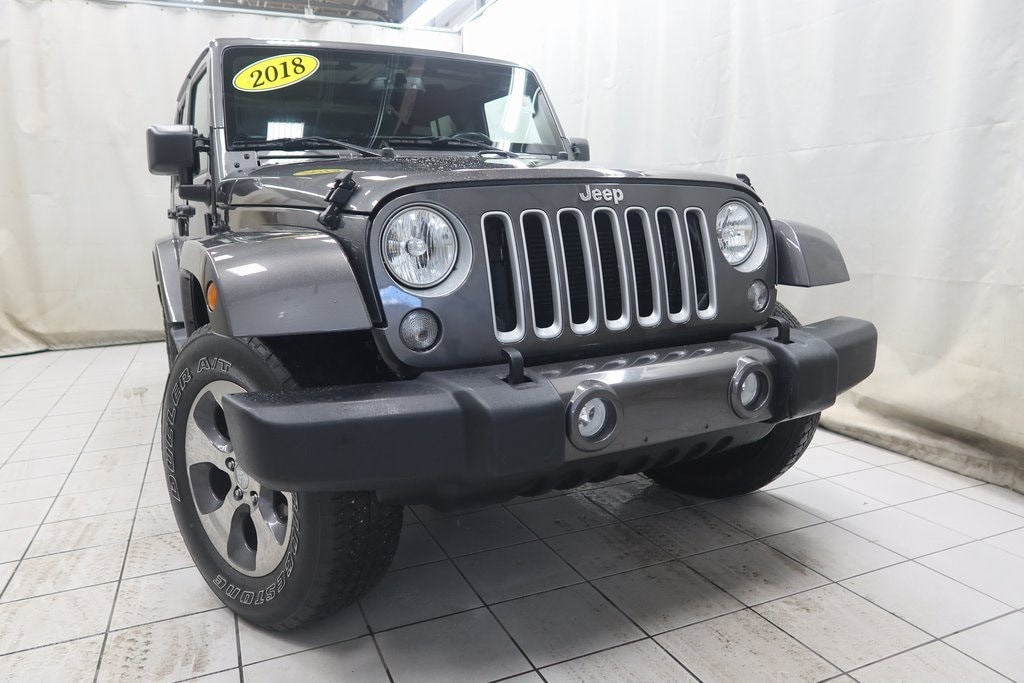 Used 2018 Jeep Wrangler Unlimited Sahara with VIN 1C4BJWEG8JL898751 for sale in Fargo, ND