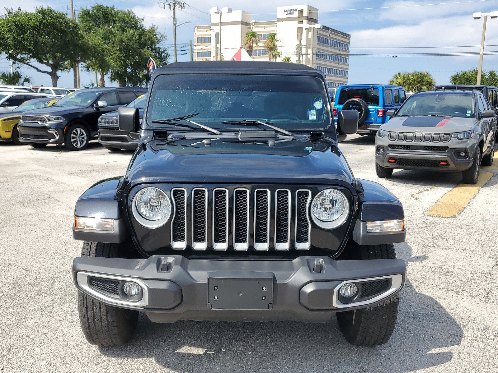 Used 2023 Jeep Wrangler 4-Door Sahara with VIN 1C4HJXEG7PW680985 for sale in Melbourne, FL