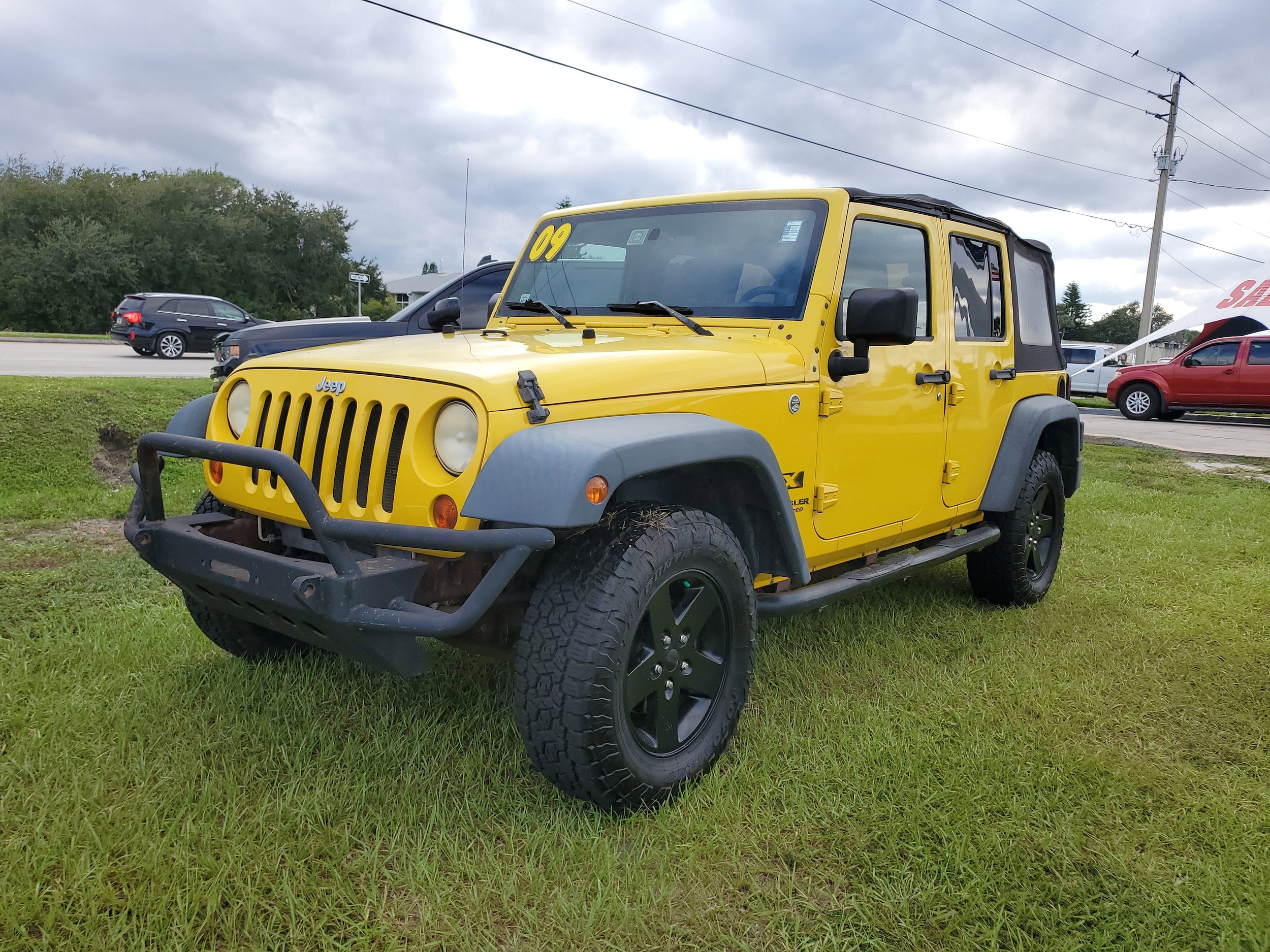 Used 2009 Jeep Wrangler Unlimited X with VIN 1J4GA39169L776244 for sale in Melbourne, FL
