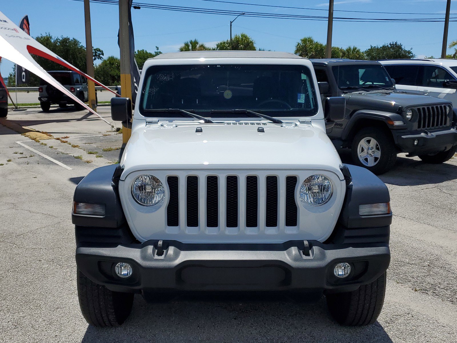 Used 2022 Jeep Wrangler Sport with VIN 1C4GJXAN1NW151528 for sale in Melbourne, FL