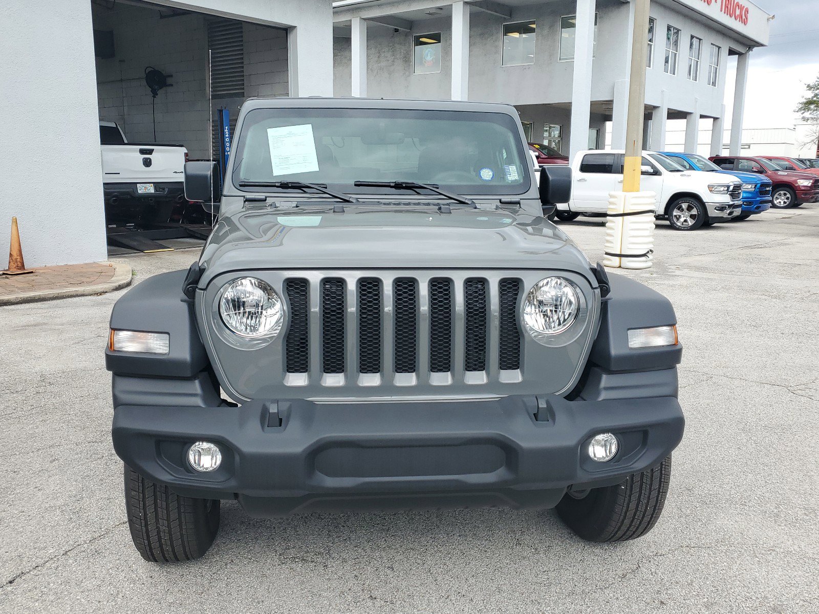 Used 2023 Jeep Wrangler 2-Door Sport S with VIN 1C4HJXAG8PW633910 for sale in Melbourne, FL