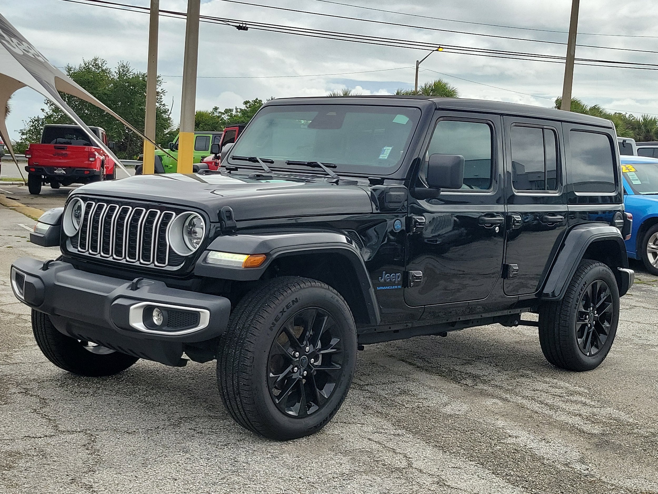 Used 2025 Jeep Wrangler 4xe Sahara 4XE with VIN 1C4RJXP66SW600304 for sale in Melbourne, FL