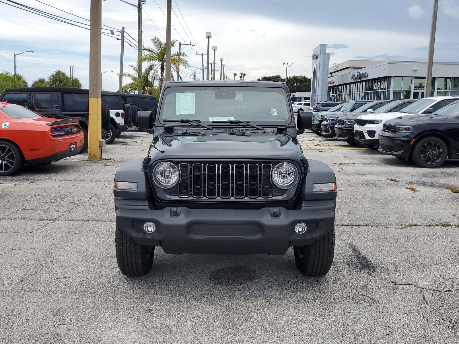 Used 2024 Jeep Wrangler 4-Door Sport S with VIN 1C4PJXDG2RW238096 for sale in Melbourne, FL