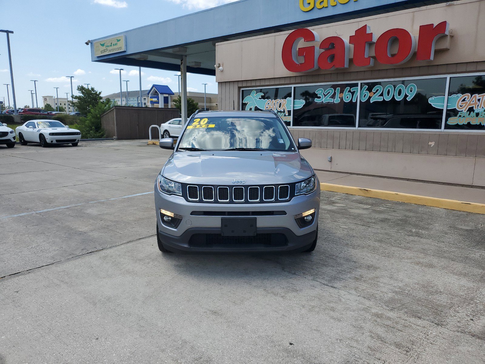 Used 2020 Jeep Compass Latitude with VIN 3C4NJDBB8LT256631 for sale in Melbourne, FL