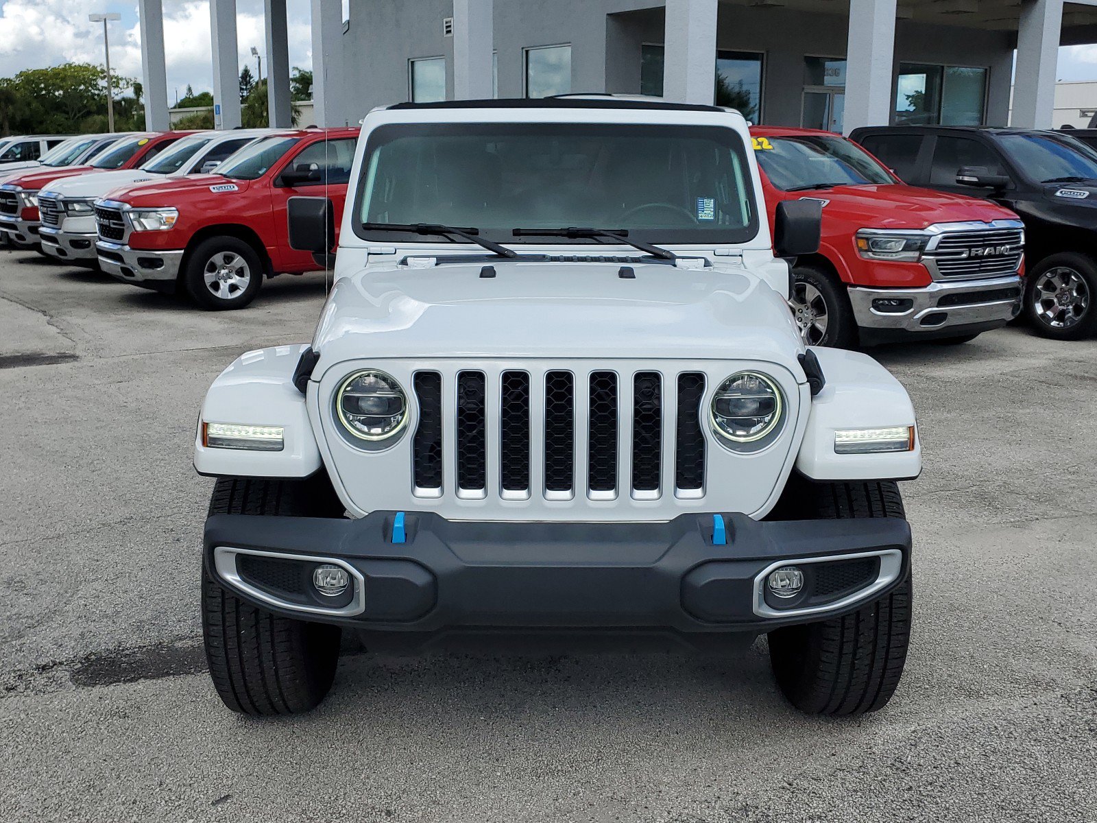 Used 2022 Jeep Wrangler Unlimited Sahara 4XE with VIN 1C4JJXP68NW100114 for sale in Melbourne, FL