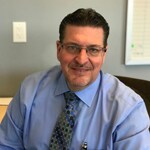 Staff member JOHN SAUTTER from 813e90df07b5