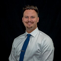Staff member Evan James Roush from ID_54397b832ca0
