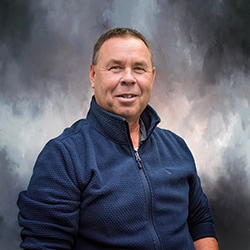 Staff member George Kramer from ID_e202d28ec3ae