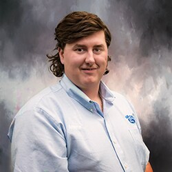 Staff member Andrew Comer from ID_e202d28ec3ae