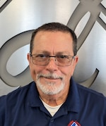 Staff member Travis Williams from ID_e7dd51fe4230