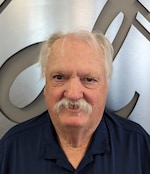 Staff member Gary Dennis from ID_e7dd51fe4230