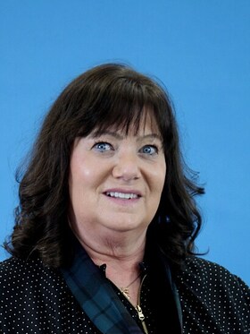 Staff member Gena Thompson from ID_76409f89cbdd