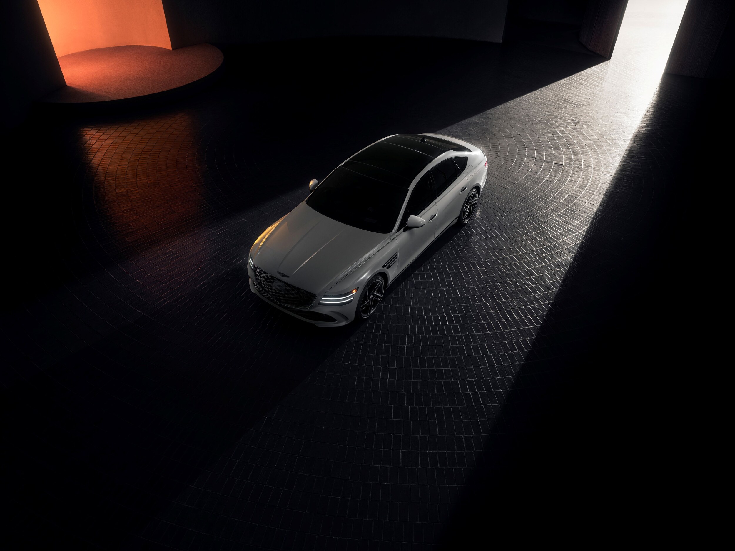  2026 Genesis G80 on cobblestone street