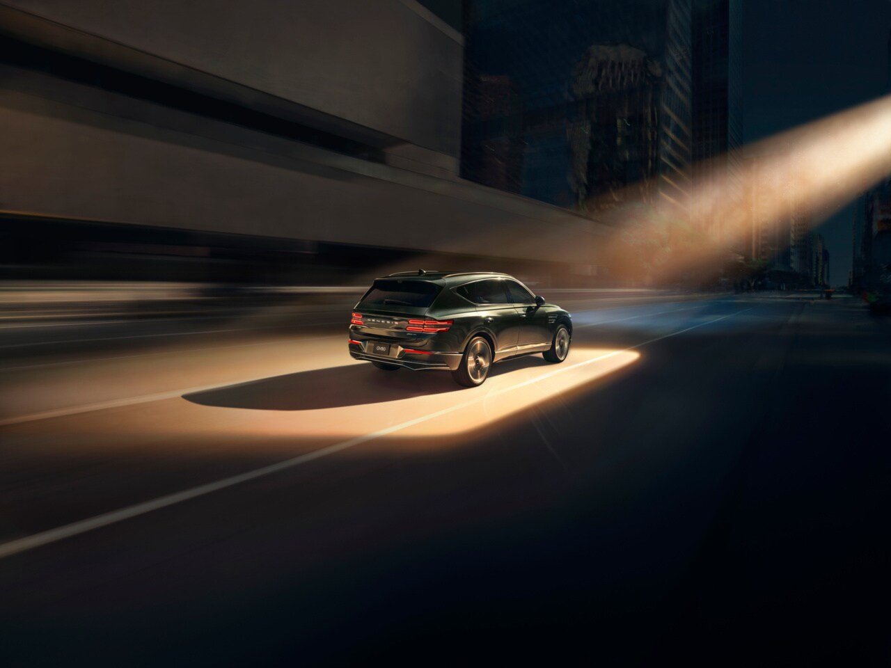 Genesis GV80 Coupe driving at night