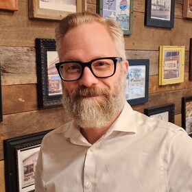 Staff member MIKE FERARO from 6a026a838d00