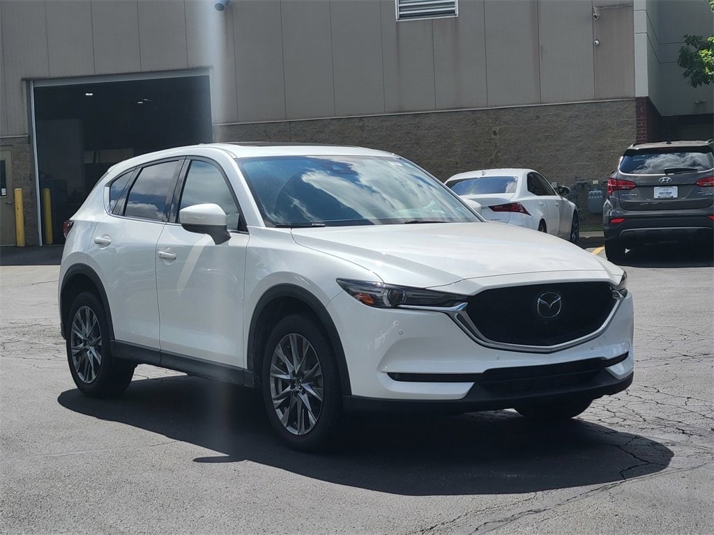 Used 2021 Mazda CX-5 Signature with VIN JM3KFBEY4M0322784 for sale in Brunswick, OH