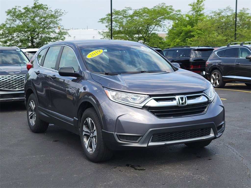 Used 2019 Honda CR-V LX with VIN 2HKRW6H35KH223079 for sale in Brunswick, OH
