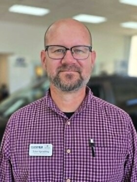 Staff member TYLER SPRADLING from ID_932715