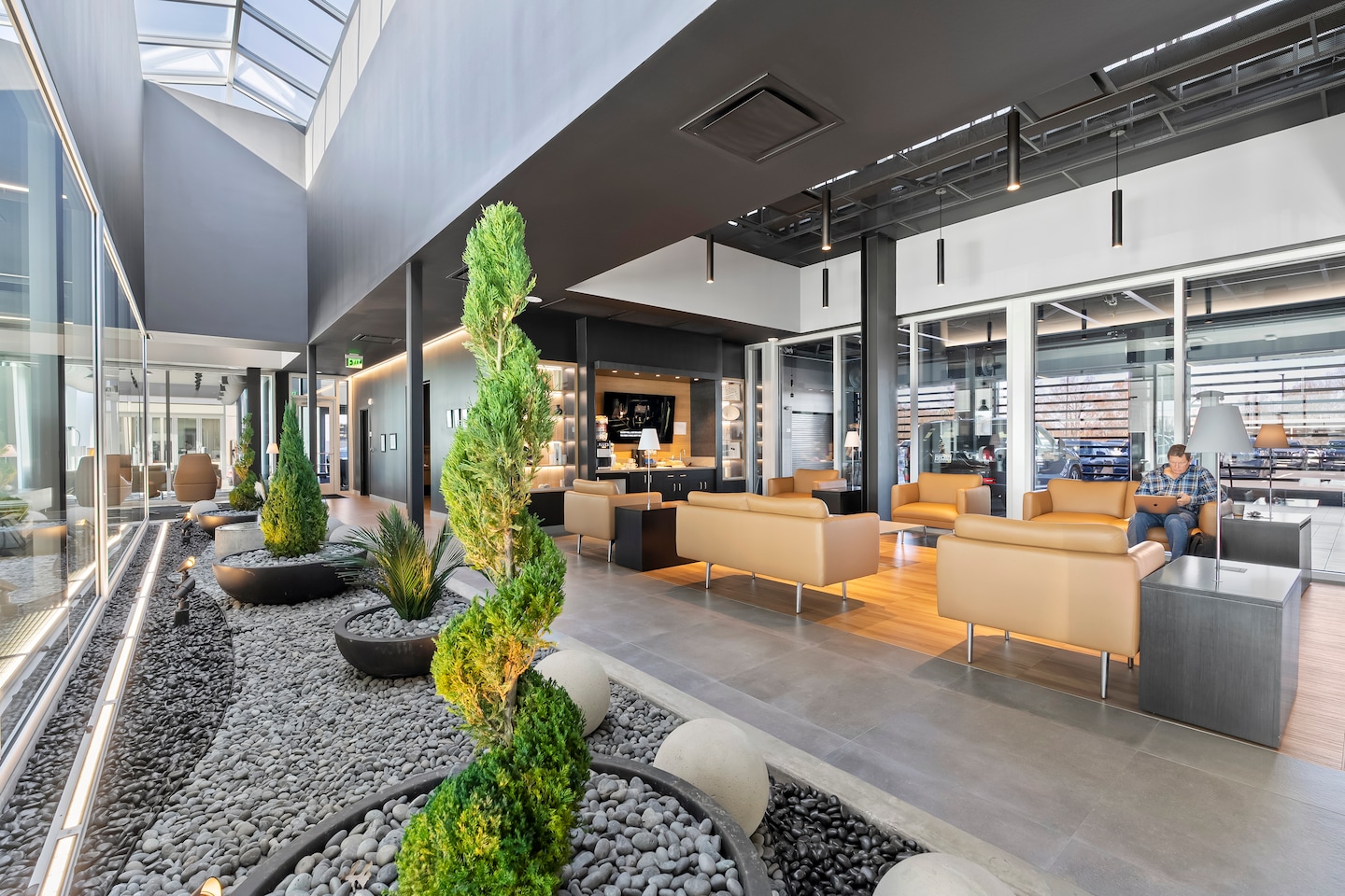 Person cheerfully signing documents.