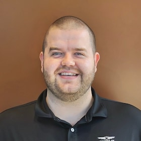 Staff member ANDREW "AJ" DOYLE from ID_9148b4