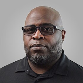 Staff member Lamar Treadwell from 198008b94d80