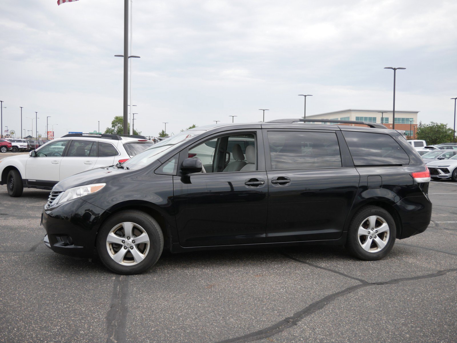 Used 2014 Toyota Sienna LE with VIN 5TDKK3DC1ES462936 for sale in Waite Park, Minnesota