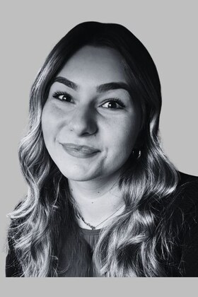 Staff member Ashley Grimes from ID_9f0fb9a597dc