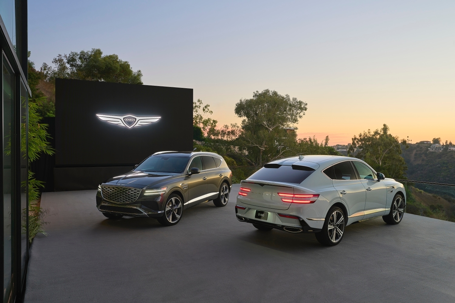 Pair of parked vehicles equipped with Genesis safety features