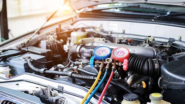 Inspecting A/C system as part of a Genesis service appointment