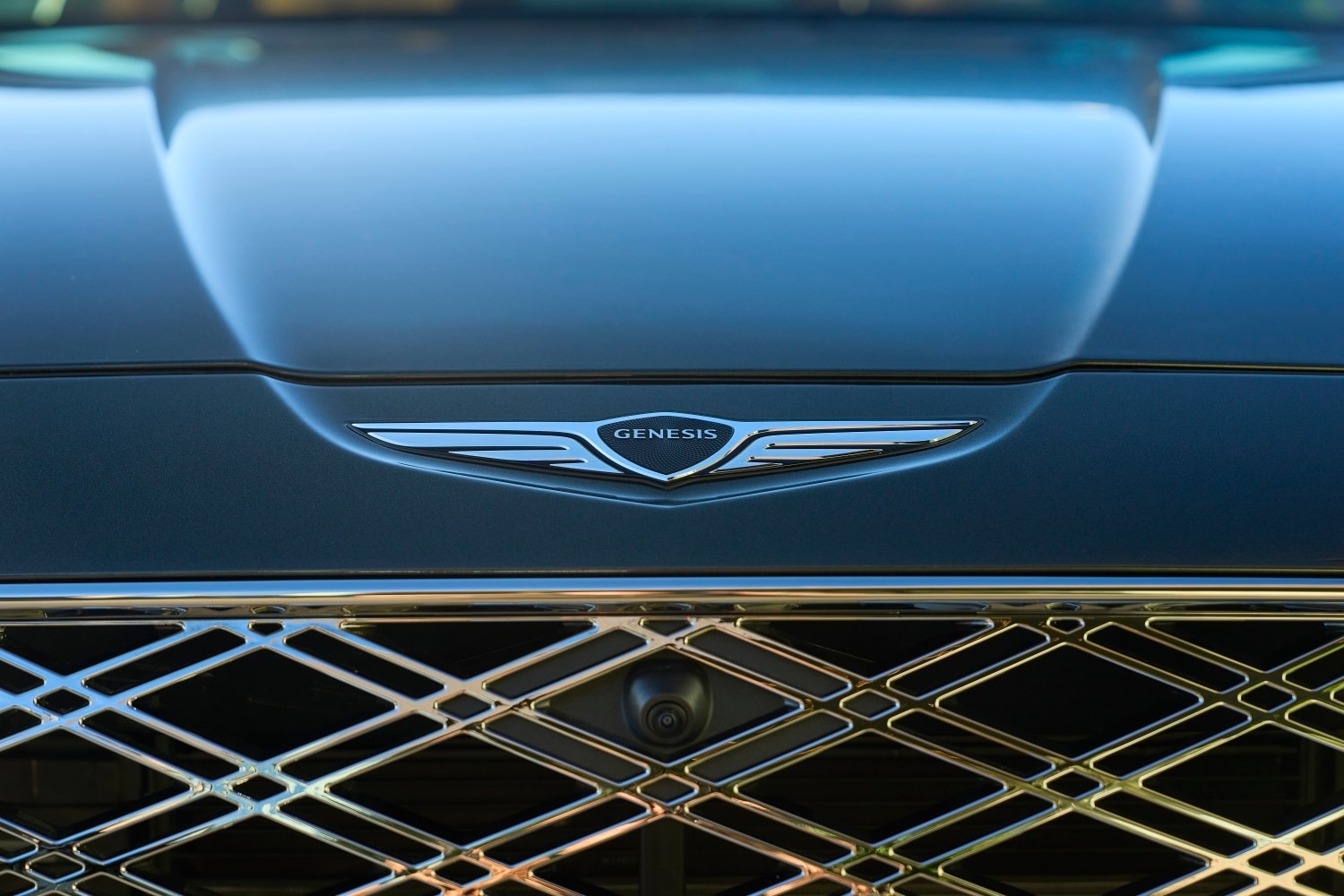 Hood of a car at a Genesis dealership