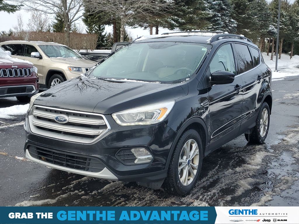 Used 2017 Ford Escape SE with VIN 1FMCU9GD8HUE51210 for sale in Saline, MI
