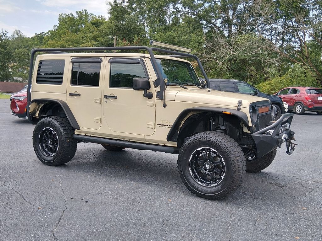 Used 2011 Jeep Wrangler Unlimited Sahara with VIN 1J4BA5H13BL595518 for sale in Travelers Rest, SC