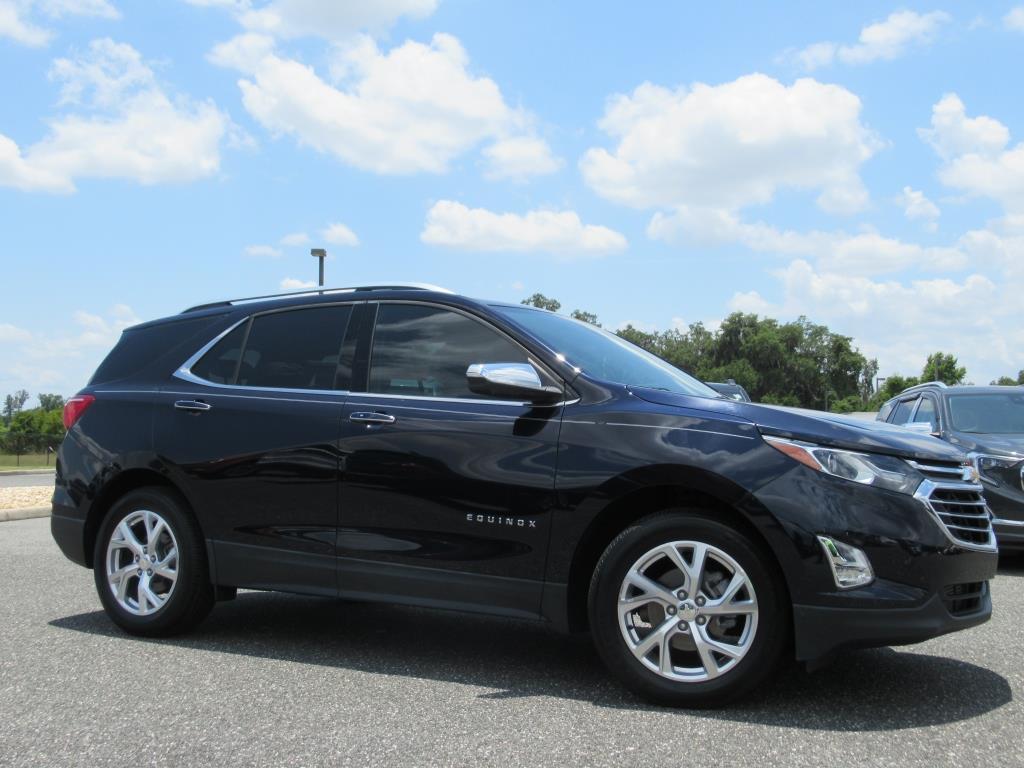 Used 2020 Chevrolet Equinox Premier with VIN 3GNAXNEV9LS525922 for sale in Wildwood, FL