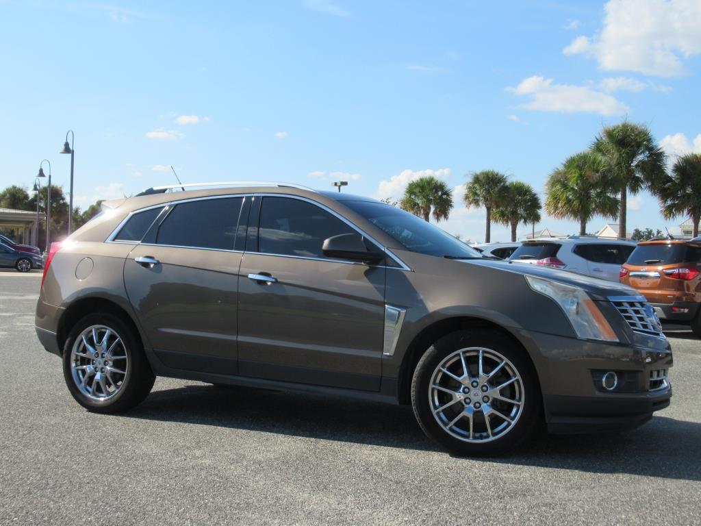 Used 2014 Cadillac SRX Performance Collection with VIN 3GYFNFE35ES678335 for sale in Wildwood, FL