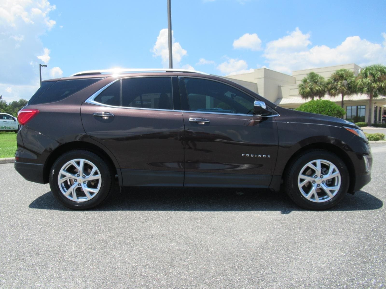 Used 2020 Chevrolet Equinox Premier with VIN 2GNAXNEV8L6157876 for sale in Wildwood, FL