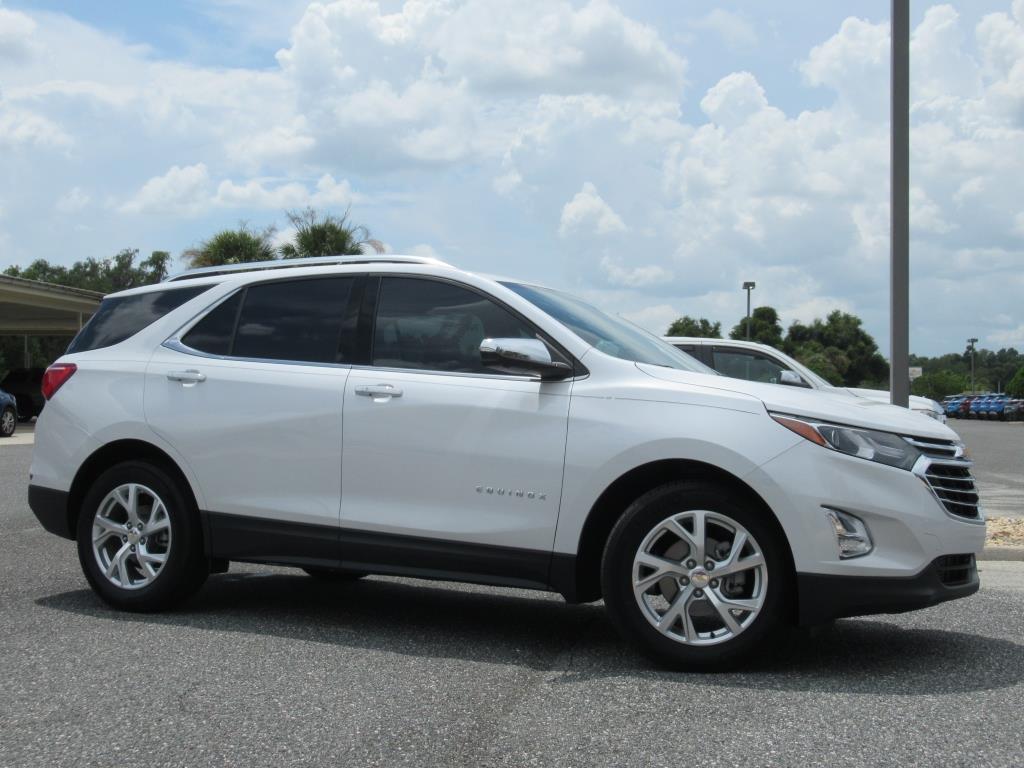 Used 2021 Chevrolet Equinox Premier with VIN 3GNAXNEVXMS107418 for sale in Wildwood, FL