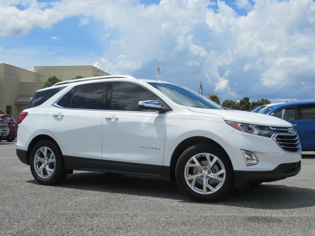 Used 2021 Chevrolet Equinox Premier with VIN 3GNAXNEV7MS183033 for sale in Wildwood, FL